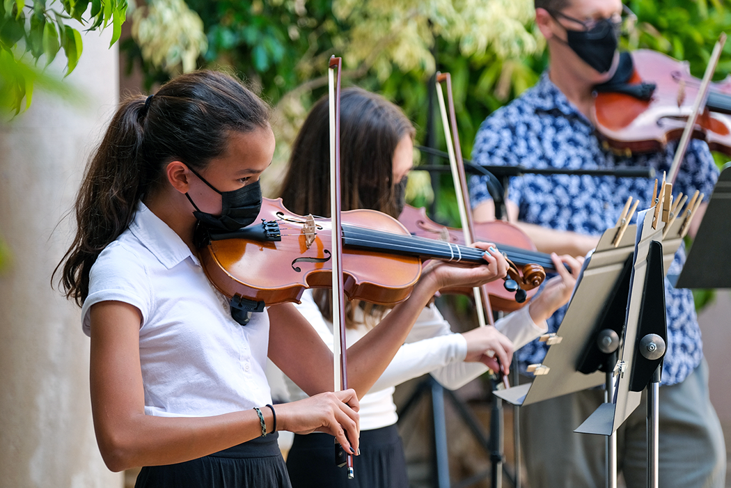 Students in the After-School Strings program perform in the Fountain Courtyard.